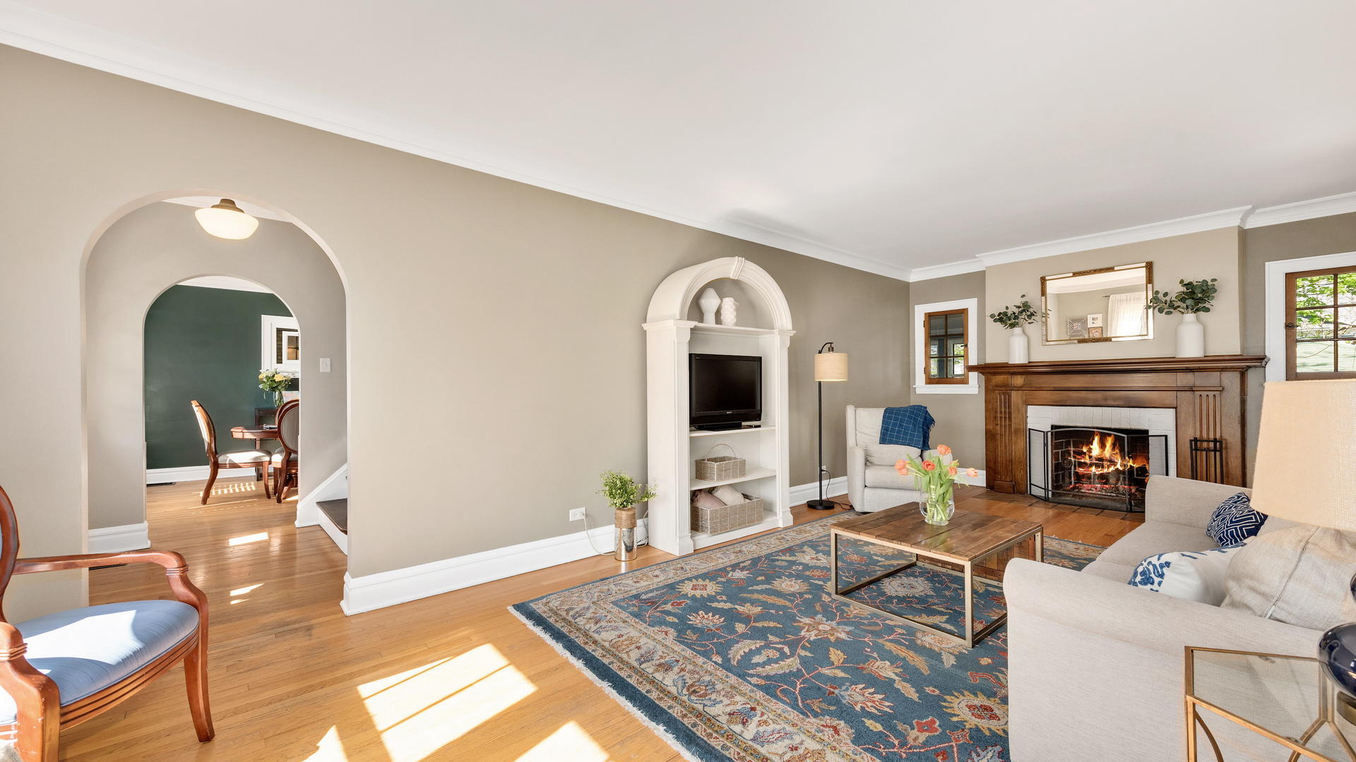 3929 Wolf Road Western Springs, IL 60558 - Photo 4 of 26 a living room with furniture and a fireplace
