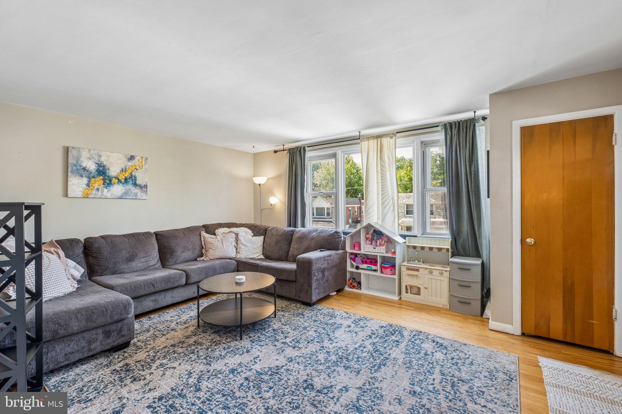 725 Hill Road Philadelphia, PA 19128 - Photo 2 of 43 a living room with furniture and a wooden floor