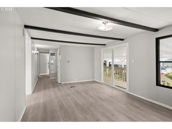 a view of an empty room and window