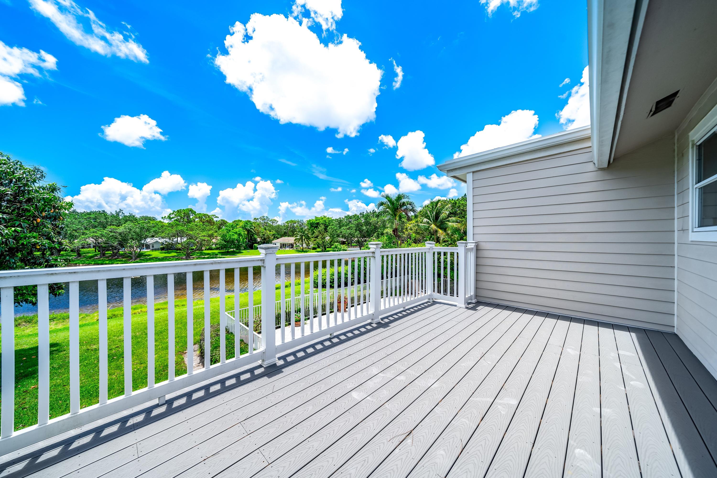 3402 Pine Haven Circle Boca Raton, FL 33431 - Photo 20 of 29 a view of a balcony with wooden floor