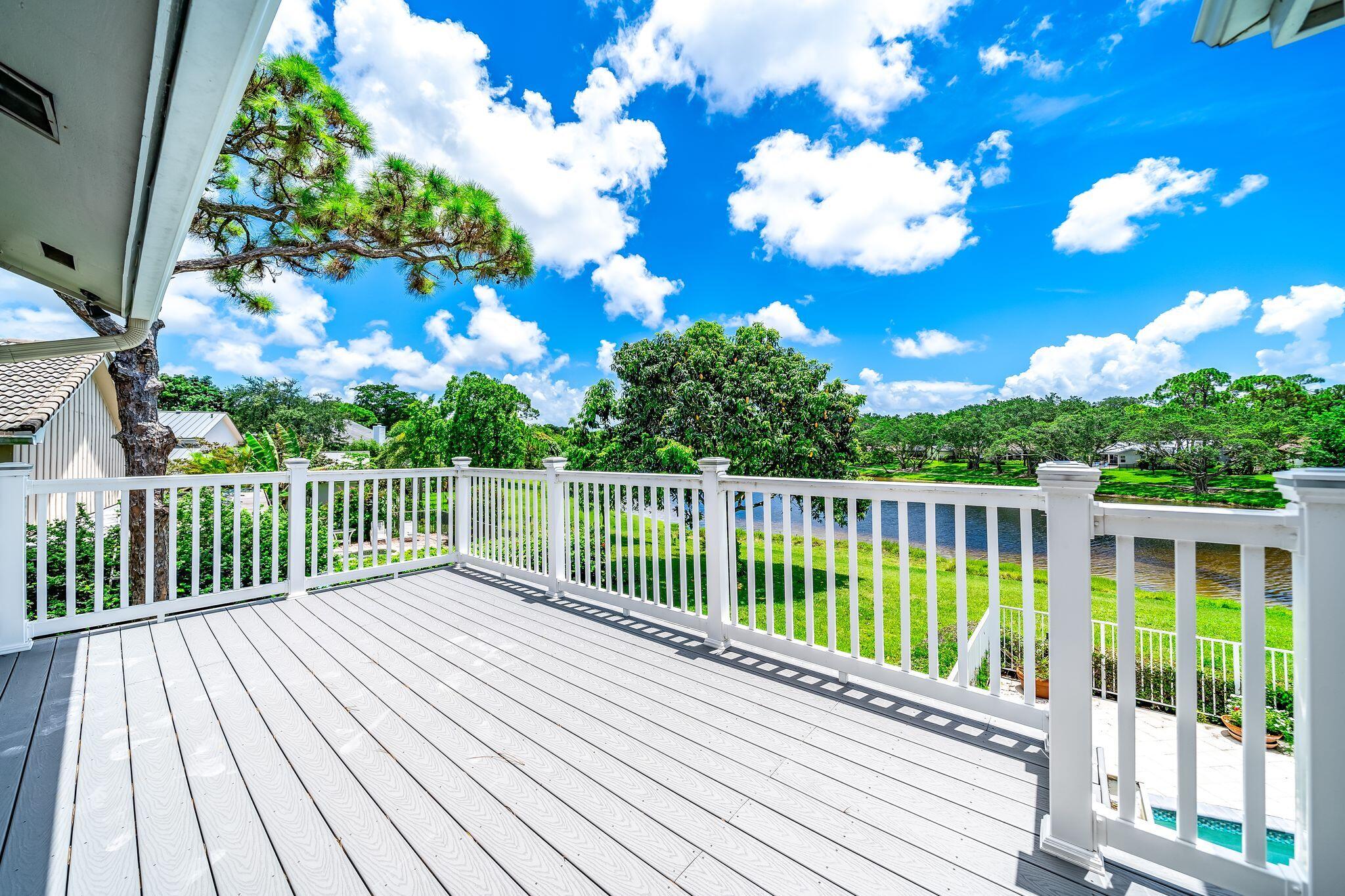 3402 Pine Haven Circle Boca Raton, FL 33431 - Photo 21 of 29 a view of a balcony with wooden floor