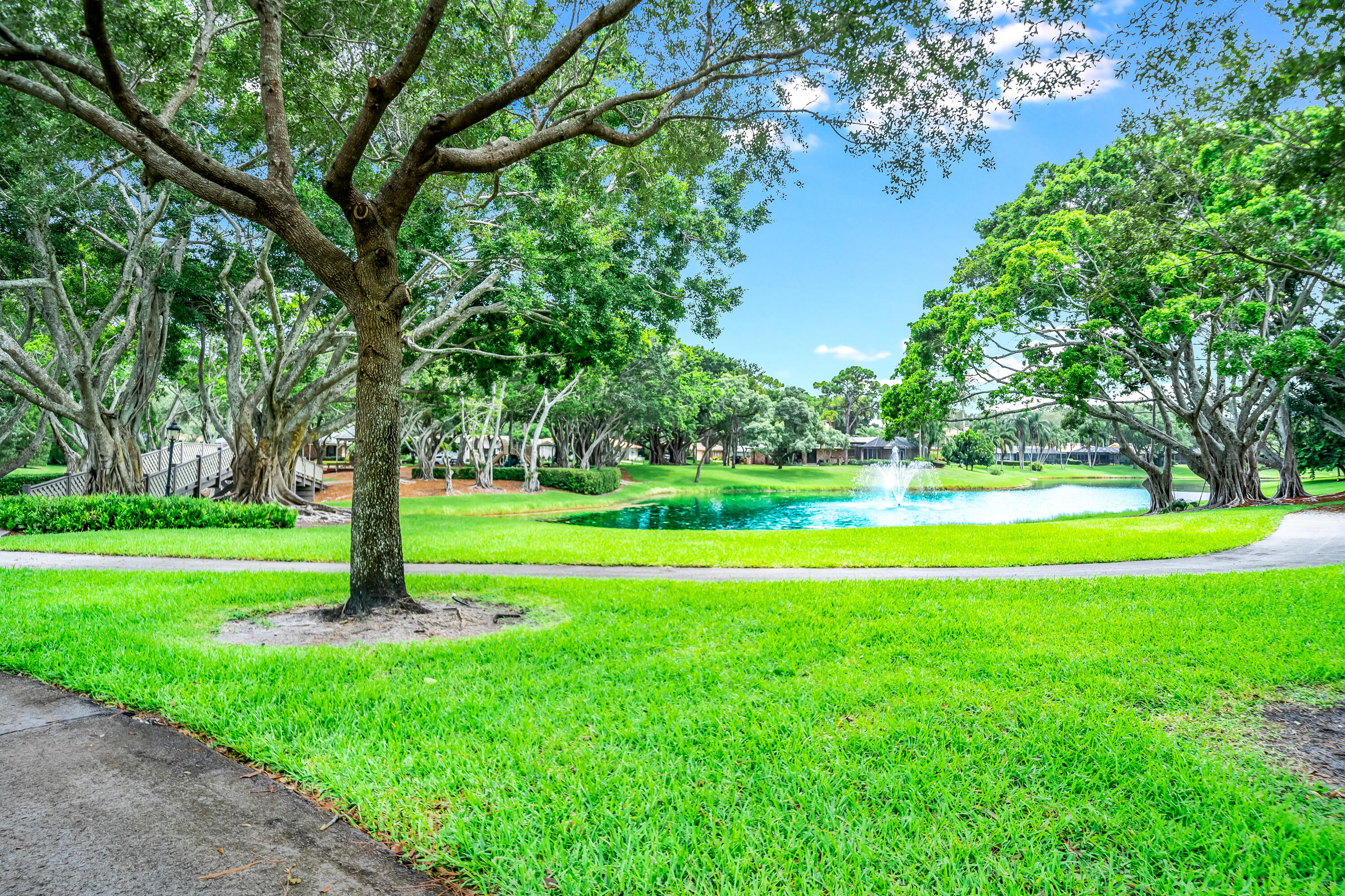 3402 Pine Haven Circle Boca Raton, FL 33431 - Photo 28 of 29 a view of a golf course with a park