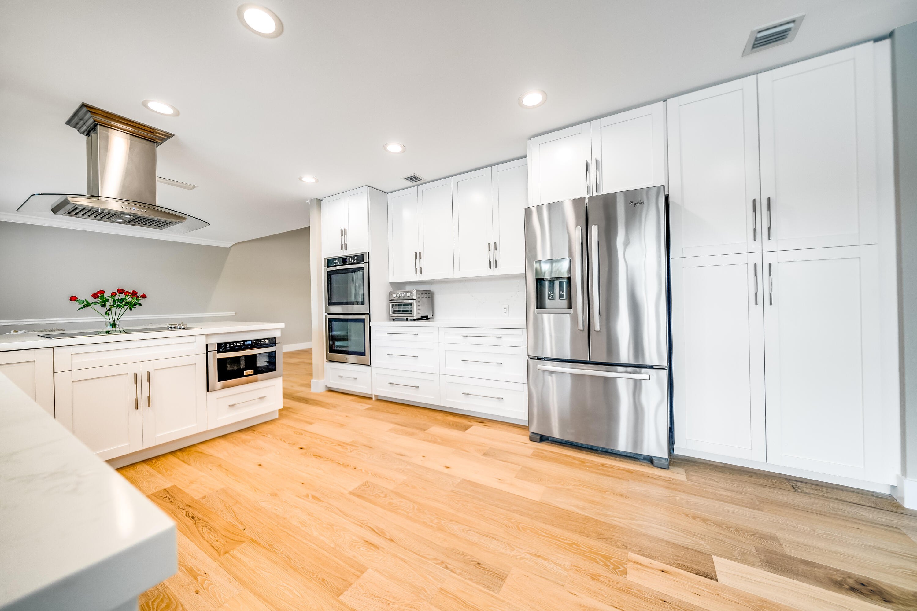 3402 Pine Haven Circle Boca Raton, FL 33431 - Photo 5 of 29 a kitchen with stainless steel appliances granite countertop a refrigerator sink and stove