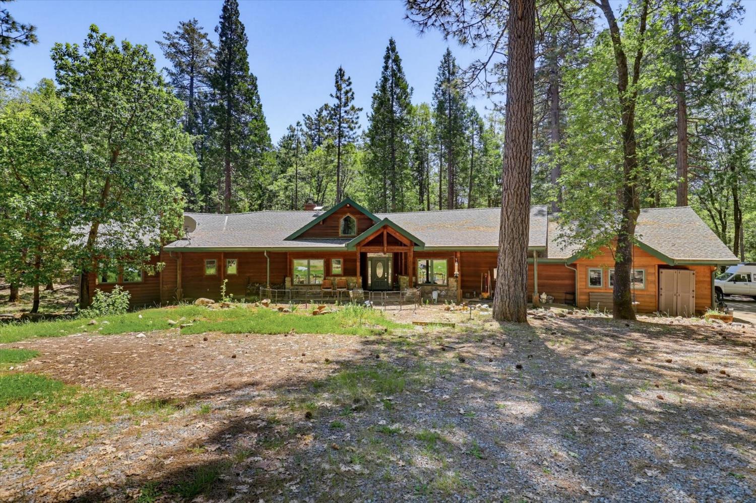 14517 North Bloomfield Road Nevada City, CA 95959 - Photo 75 of 78 a view of a house with a yard and large tree