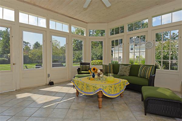 25 Irving Street Hingham, MA 02043 - Photo 14 of 30 a living room with patio furniture and a large window