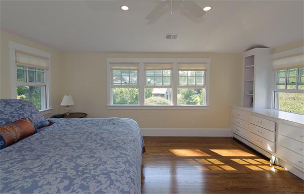 25 Irving Street Hingham, MA 02043 - Photo 17 of 30 a bedroom with bed and window