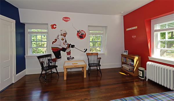 25 Irving Street Hingham, MA 02043 - Photo 20 of 30 a view of a dining room with furniture a chandelier and wooden floor