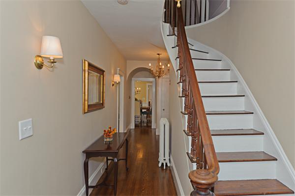 25 Irving Street Hingham, MA 02043 - Photo 2 of 30 a view of entryway and hall with wooden floor