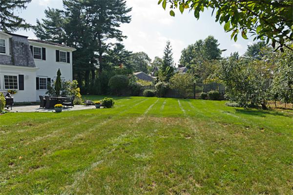 25 Irving Street Hingham, MA 02043 - Photo 28 of 30 a view of a backyard with a slide