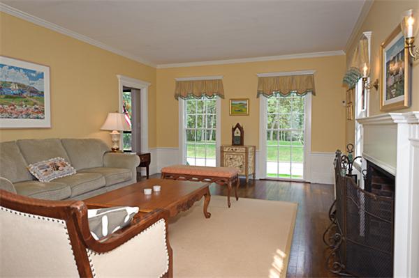 25 Irving Street Hingham, MA 02043 - Photo 6 of 30 a living room with furniture and a large window