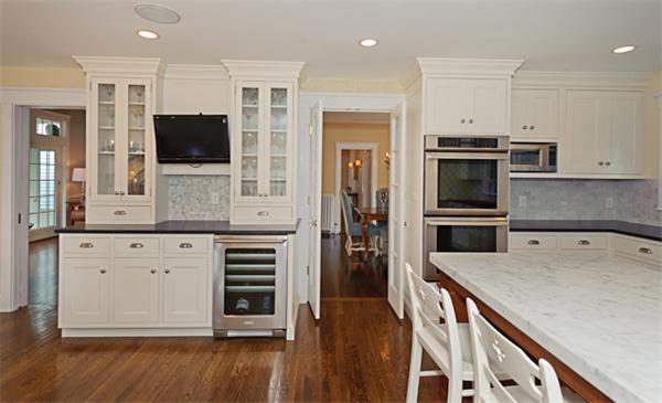 25 Irving Street Hingham, MA 02043 - Photo 9 of 30 a kitchen with stainless steel appliances a stove microwave and refrigerator