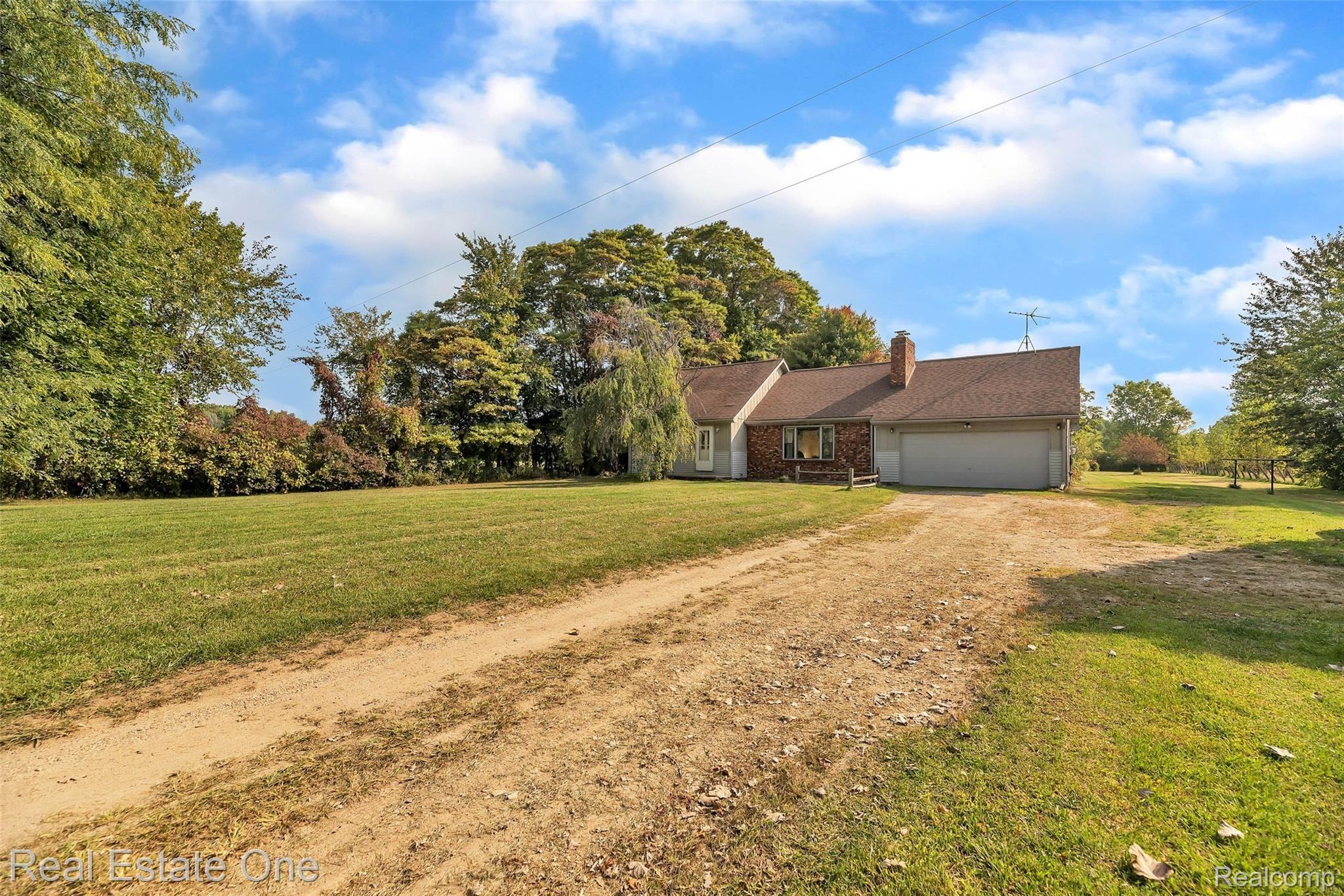 5400 North Fleming Road Fowlerville, MI 48836 - Photo 3 of 40 06-5400 Fleming Rd-WindowStill-Real.jpg