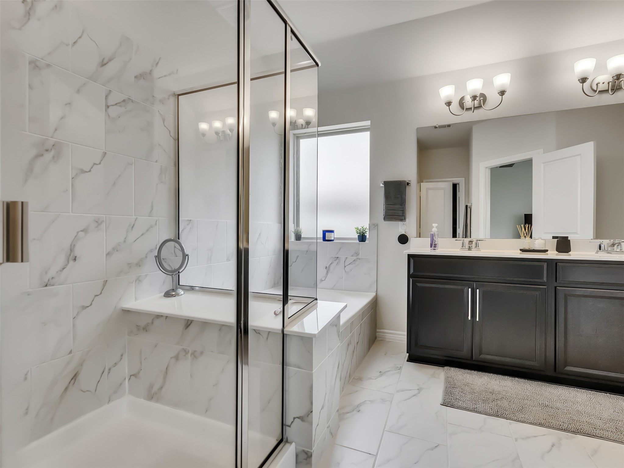 27997 Lone Hollow Lane Spring, TX 77386 - Photo 41 of 45 a bathroom with a bathtub shower sink and mirror