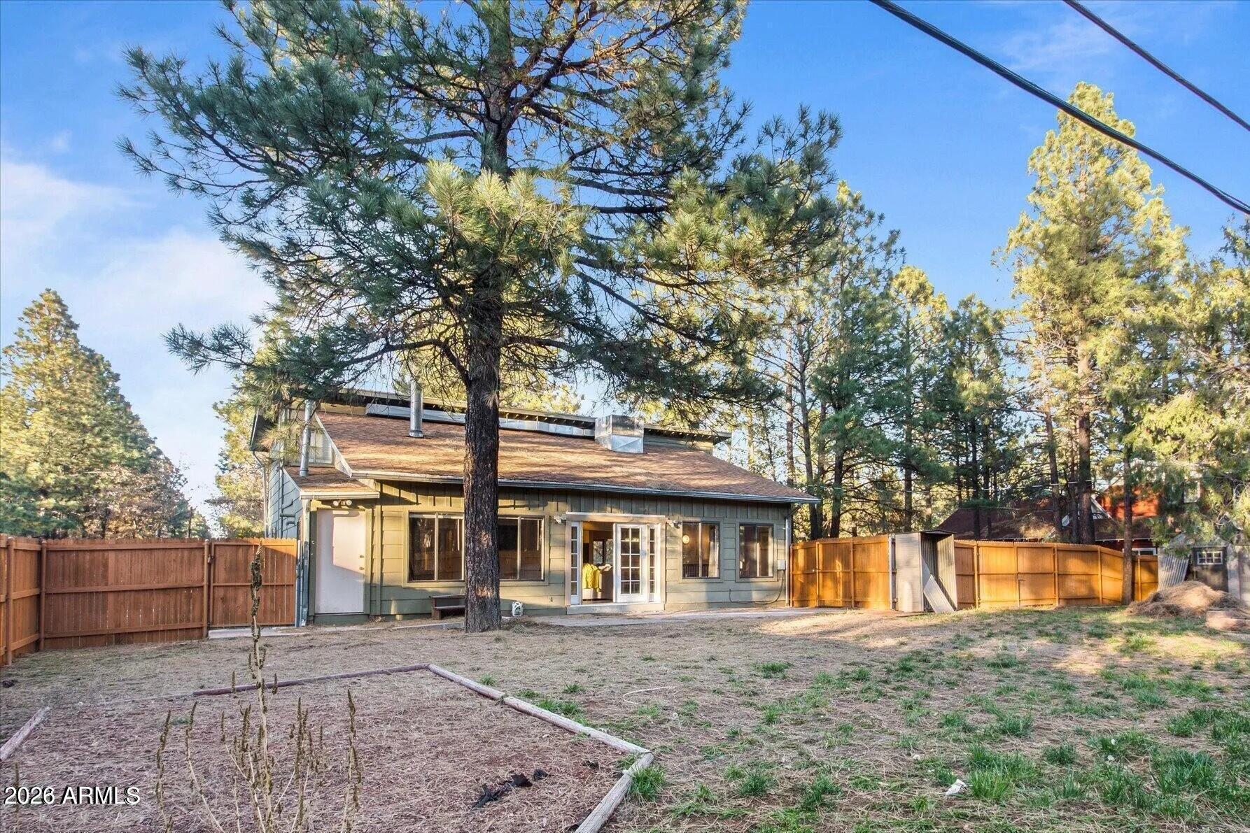 5065 Forest View Road Lakeside, AZ 85929 - Photo 20 of 24 front view of a house with a trees