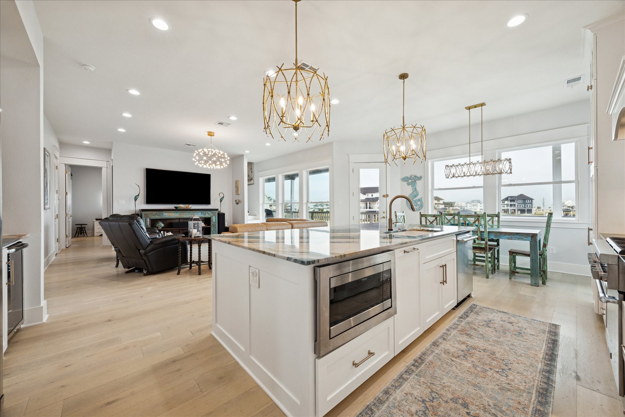 5 Loggerhead Hitchcock, TX 77563 - Photo 13 of 50 a kitchen with stove and cabinets