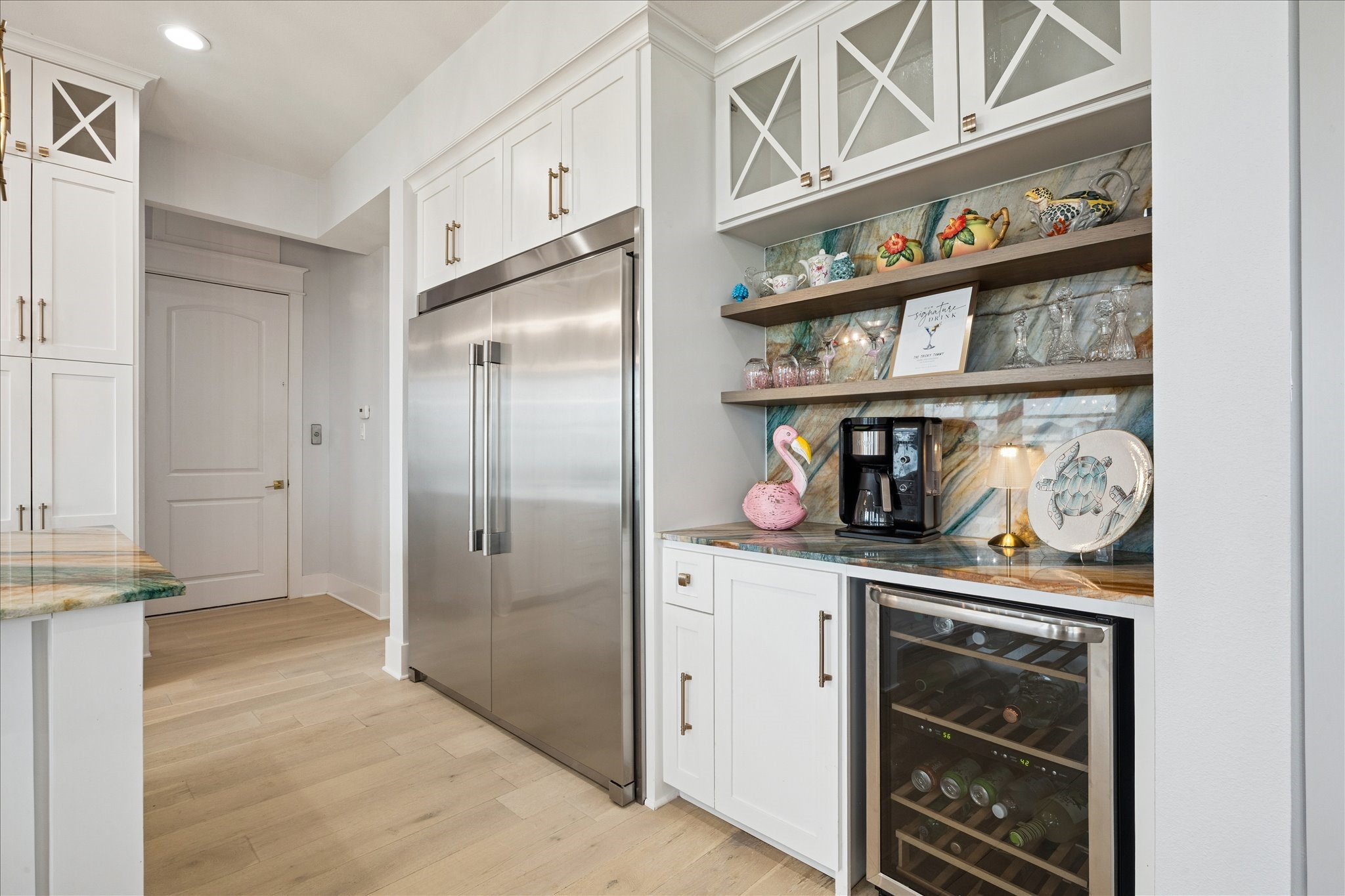 5 Loggerhead Hitchcock, TX 77563 - Photo 16 of 50 a kitchen with stainless steel appliances granite countertop a refrigerator and a sink