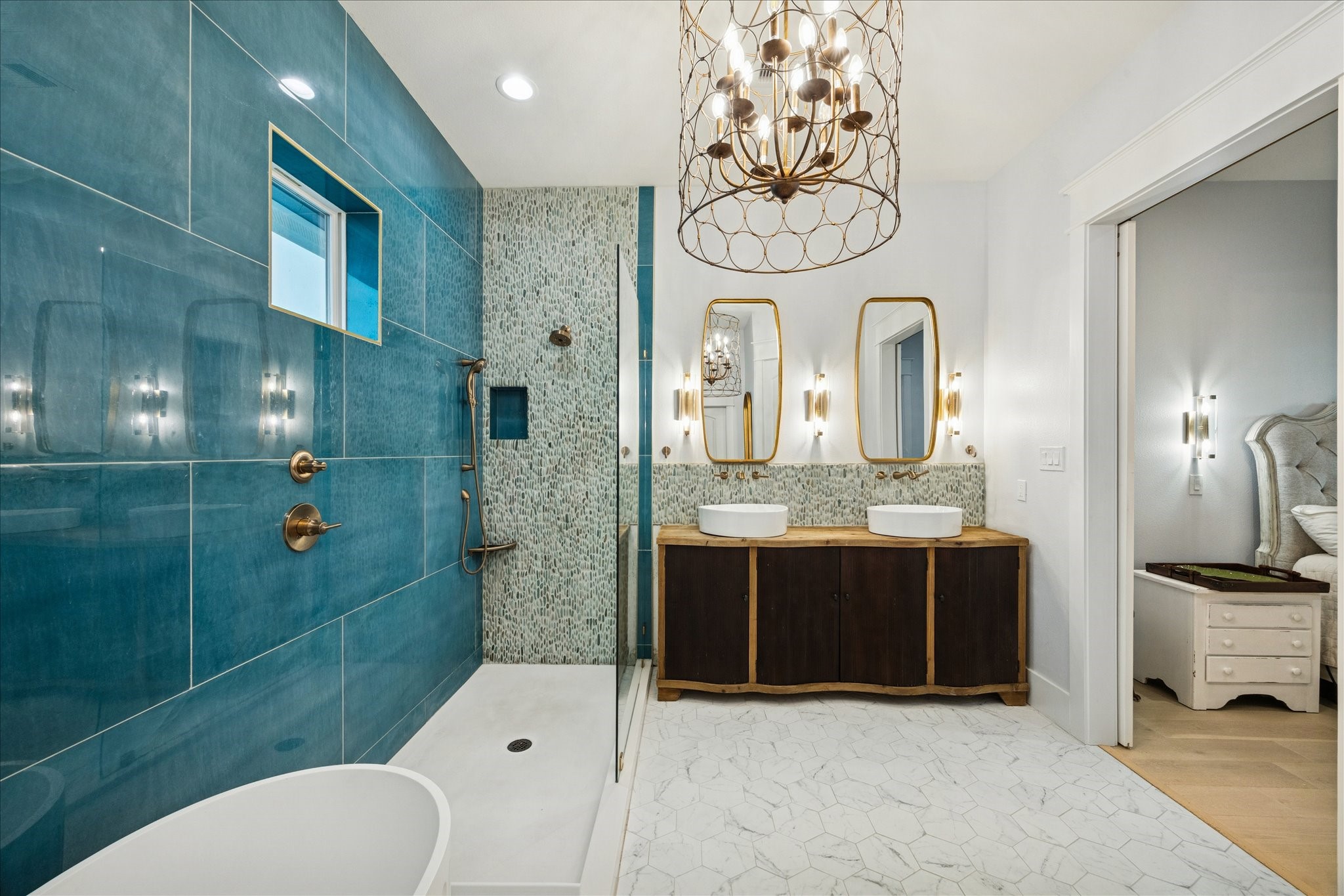 5 Loggerhead Hitchcock, TX 77563 - Photo 23 of 50 a bathroom with a sink a toilet and shower