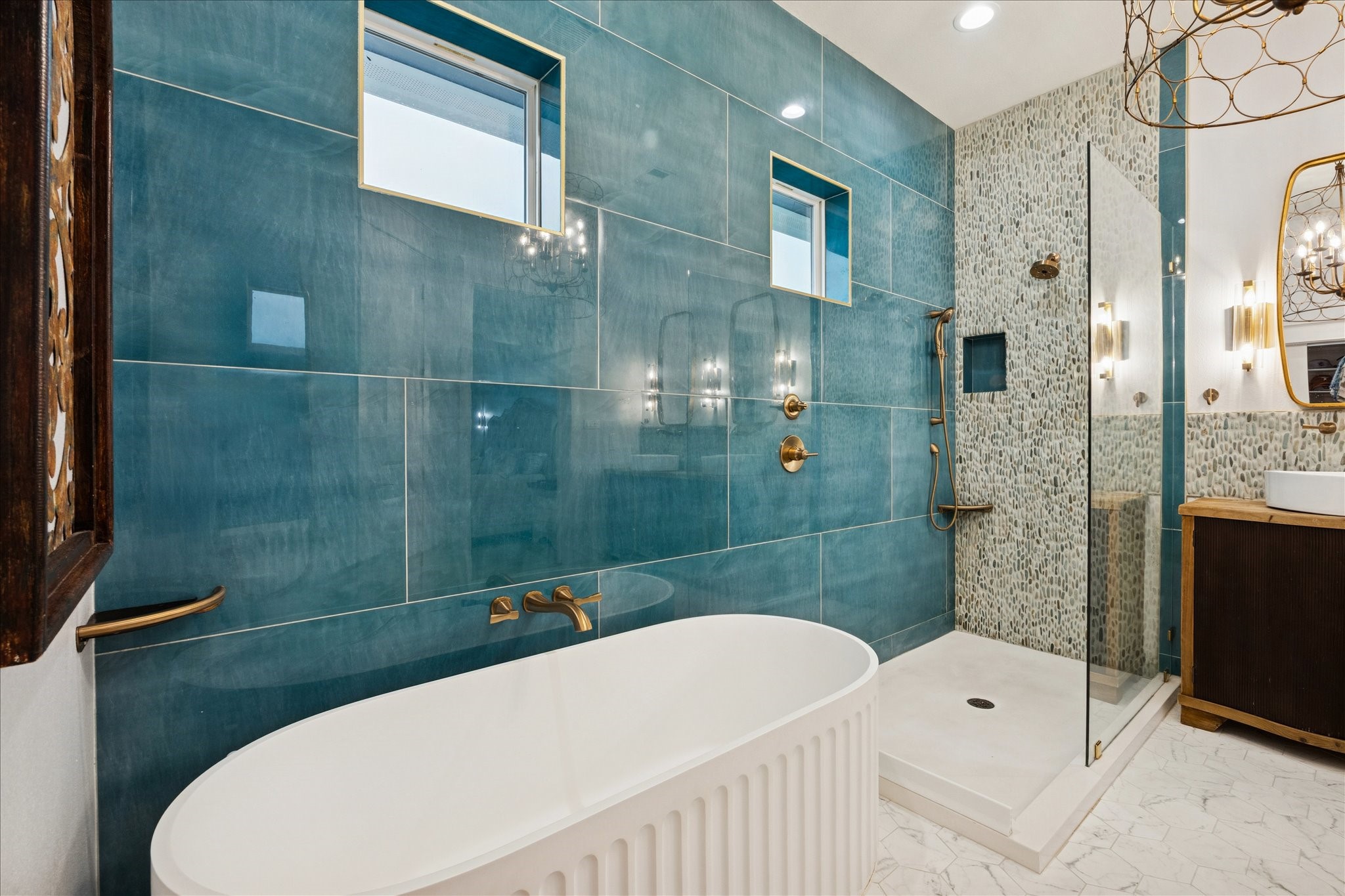 5 Loggerhead Hitchcock, TX 77563 - Photo 26 of 50 a bathroom with a bathtub shower sink mirror and toilet