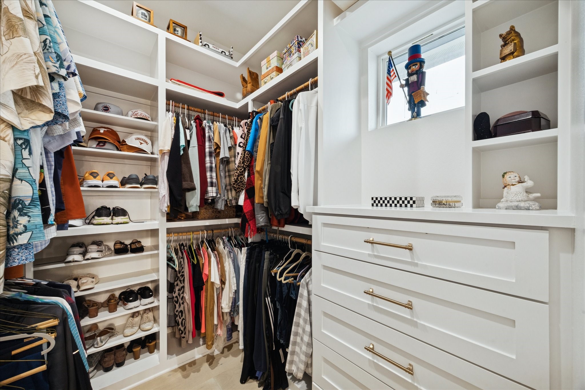 5 Loggerhead Hitchcock, TX 77563 - Photo 27 of 50 a view of walk in closet with clothes and shoes