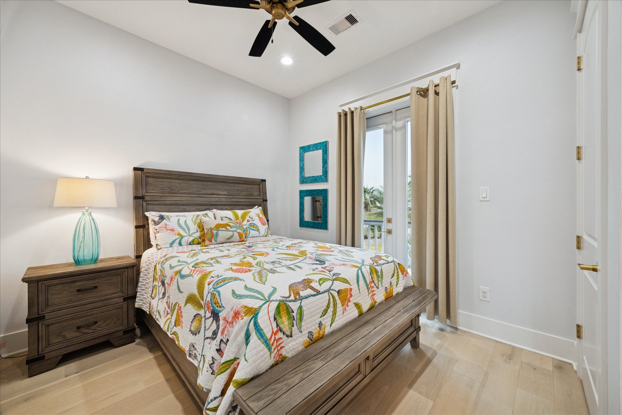 5 Loggerhead Hitchcock, TX 77563 - Photo 28 of 50 a bedroom with a bed and large windows