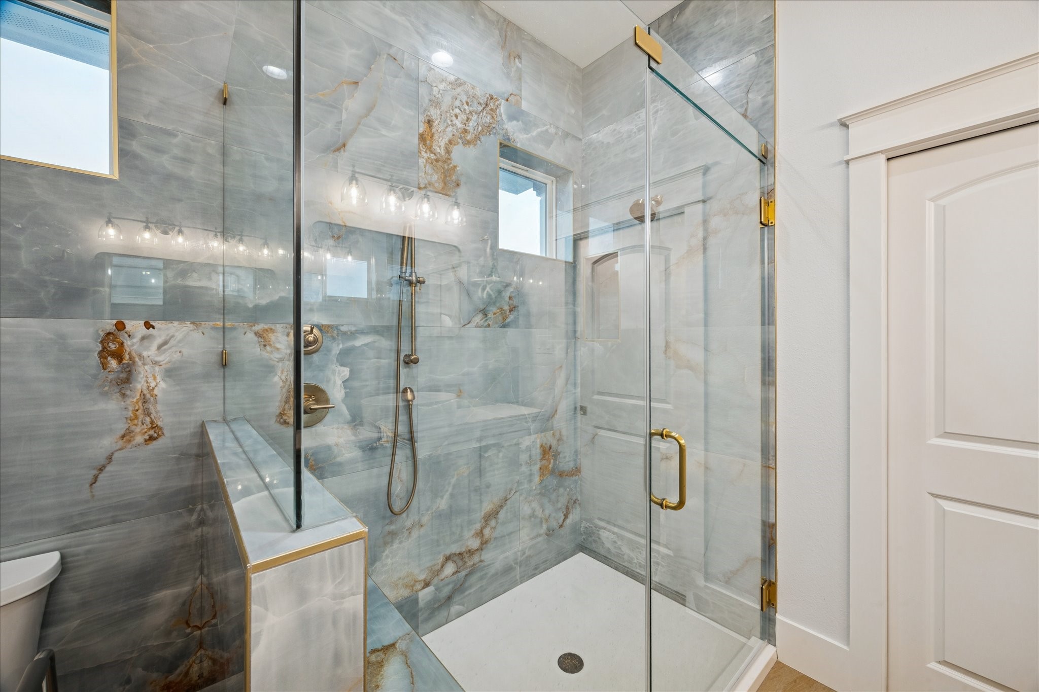 5 Loggerhead Hitchcock, TX 77563 - Photo 30 of 50 a bathroom with a shower and toilet