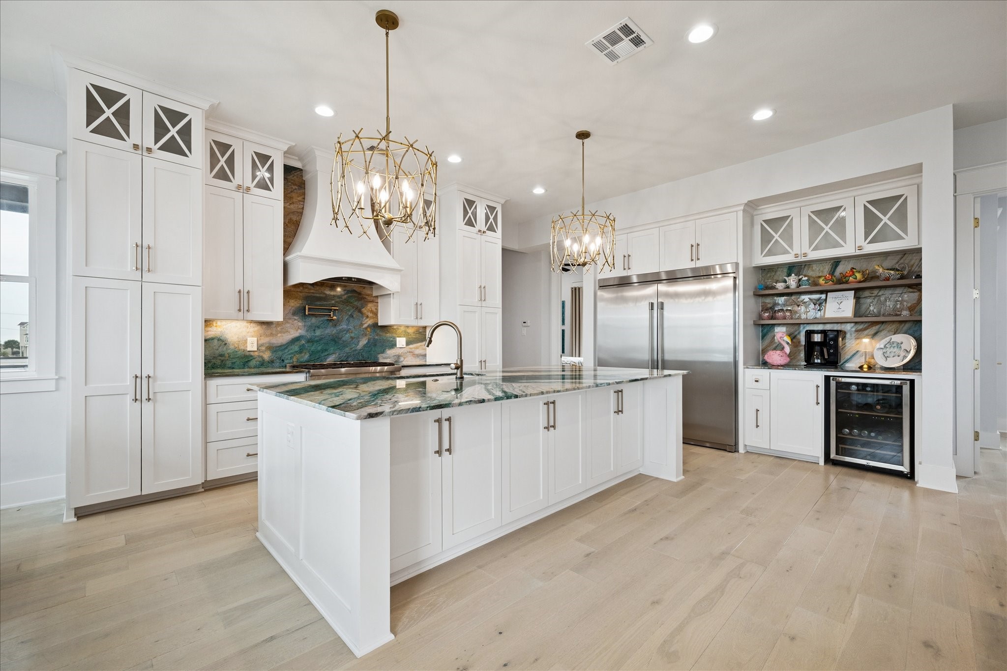 5 Loggerhead Hitchcock, TX 77563 - Photo 10 of 50 a kitchen with stainless steel appliances granite countertop a refrigerator a oven and a sink