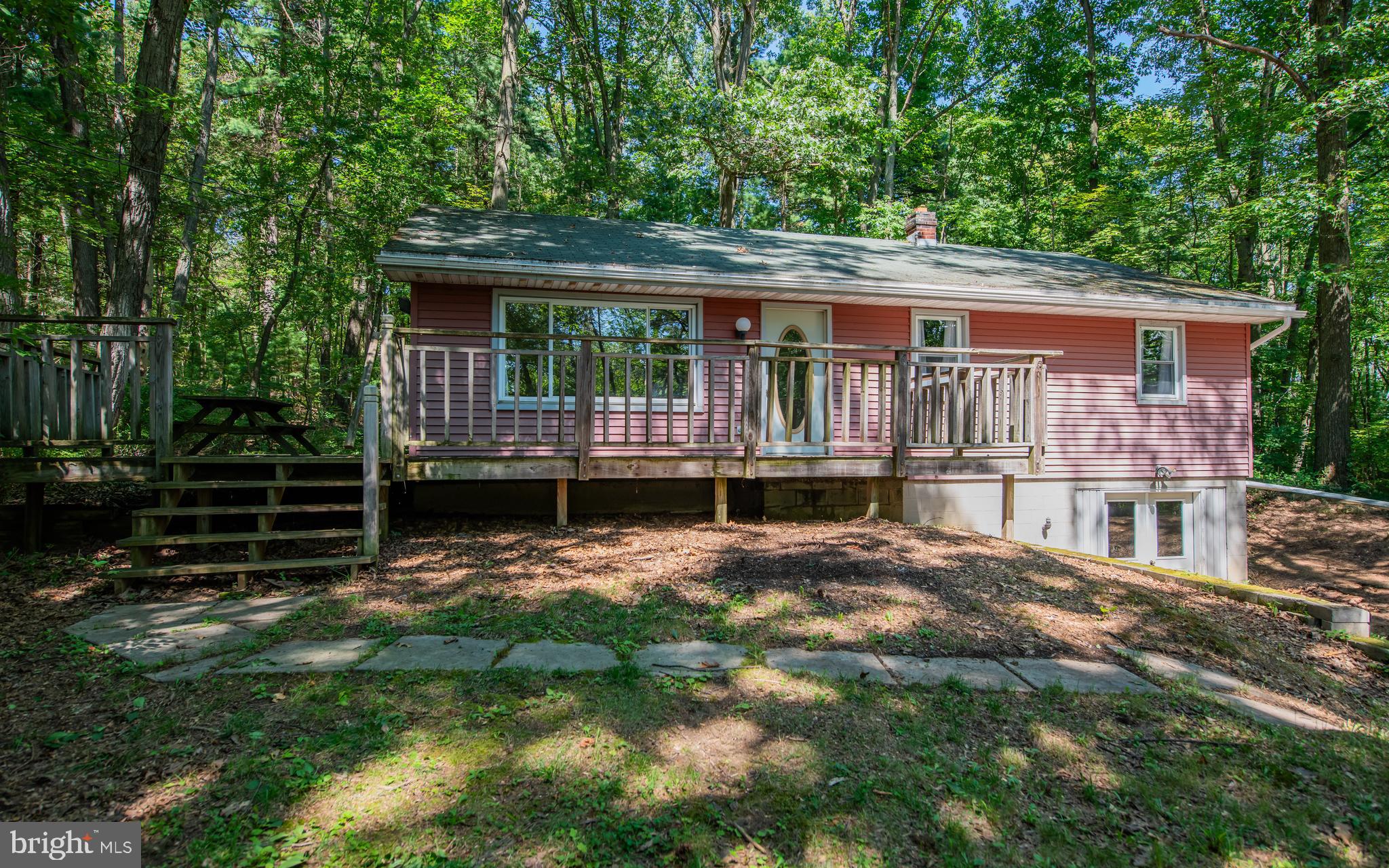 428 Hubler Ridge Road Howard, PA 16841 - Photo 1 of 19 a backyard of a house with seating space