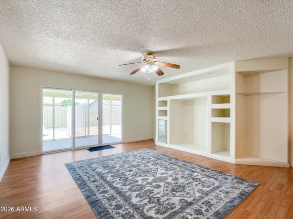 a view of a livingroom with a workspace