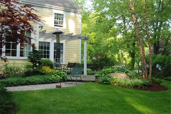 19 Southgate Road Wellesley, MA 02482 - Photo 12 of 14 a view of a house with a yard and sitting area