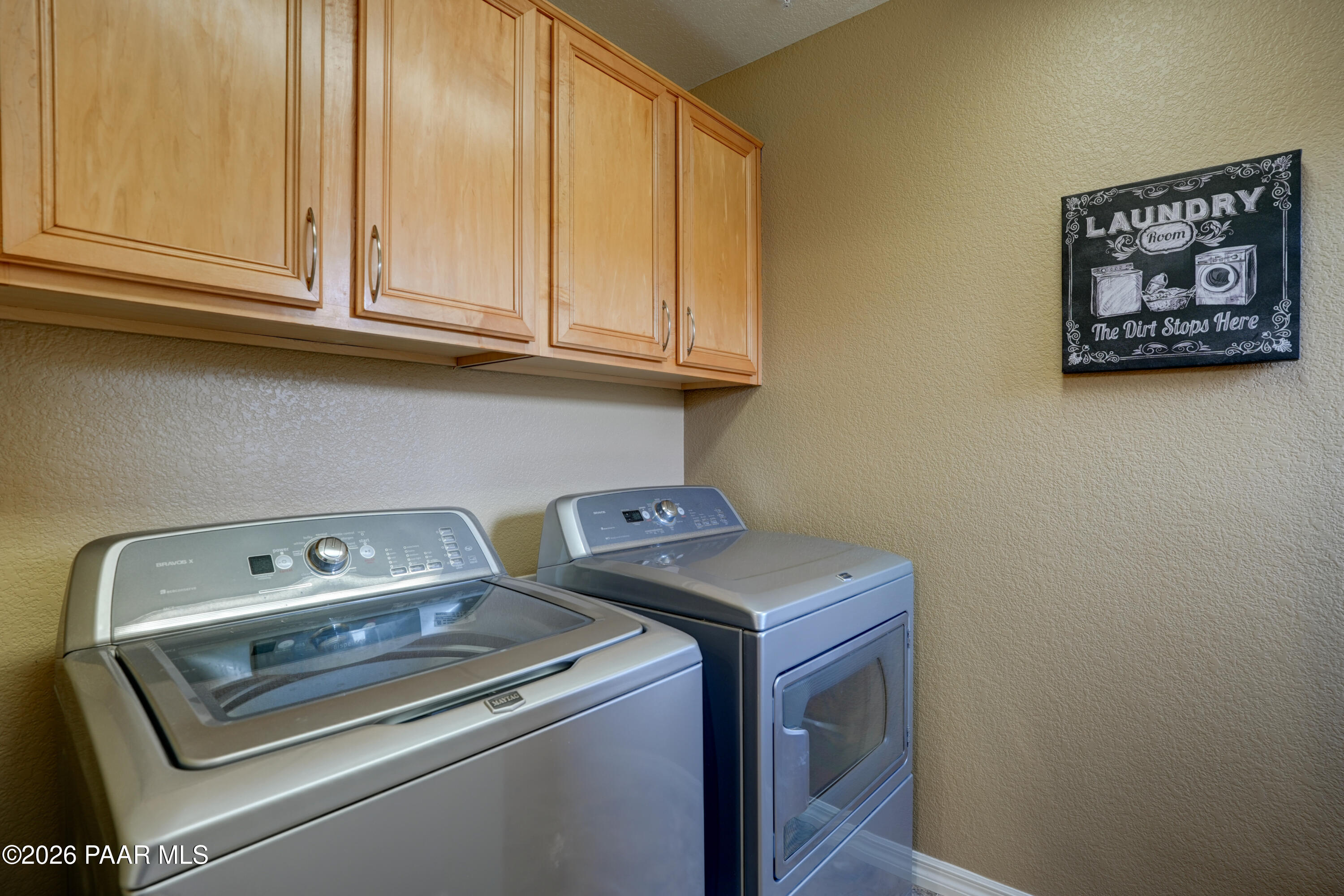 1716 Alpine Meadows Lane, Unit 405 Prescott, AZ 86303 - Photo 18 of 29 a utility room with dryer and washer