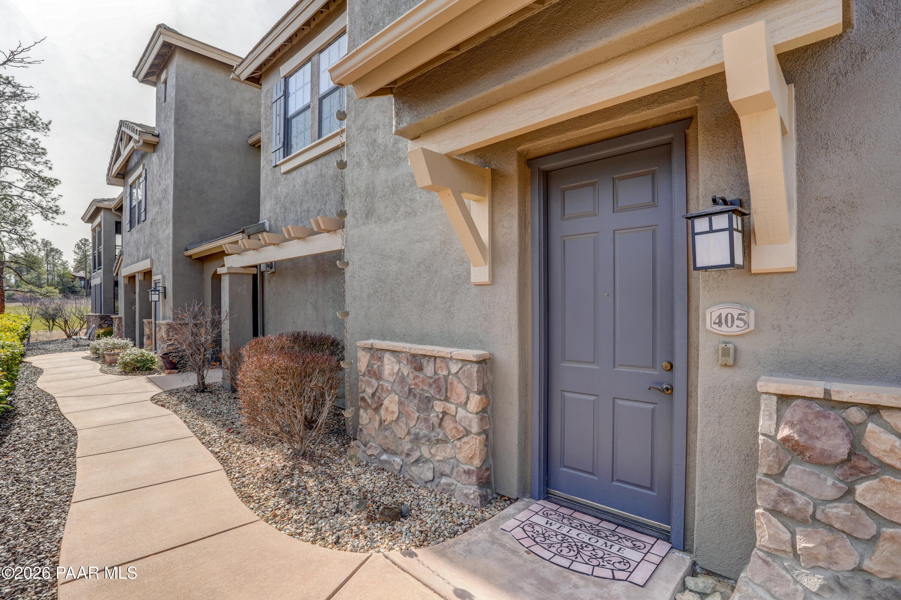 1716 Alpine Meadows Lane, Unit 405 Prescott, AZ 86303 - Photo 2 of 29 a view of a entrance of the house
