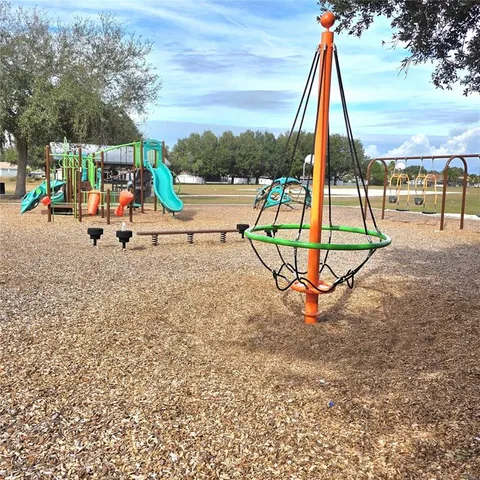a view of a park with slide