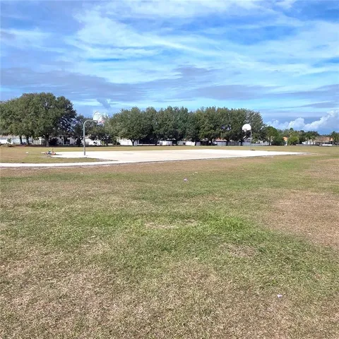 an aerial view of city and lake