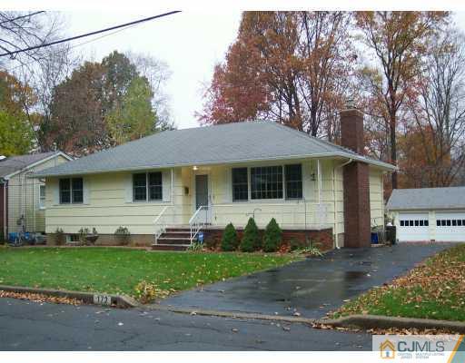 172 Normandy Road Colonia, NJ 07067 - Photo 1 of 5 a front view of a house with a yard