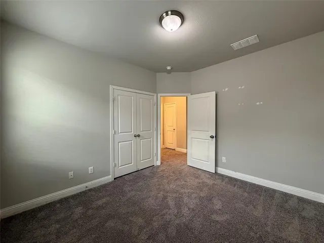 an empty room with an entryway