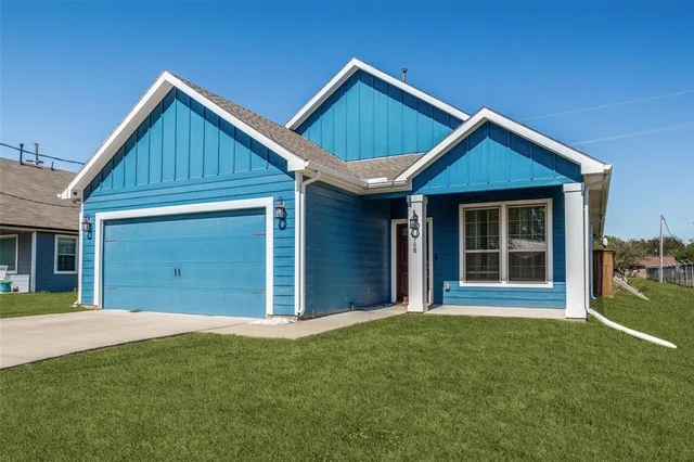 a view of a house with garden