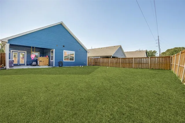 a house view with garden space