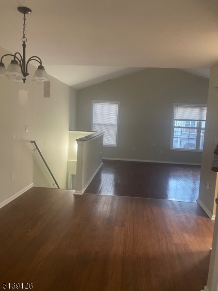 406 South 7th Street, Unit 2 Newark, NJ 07103 - Photo 6 of 9 a view of an empty room with window and wooden floor