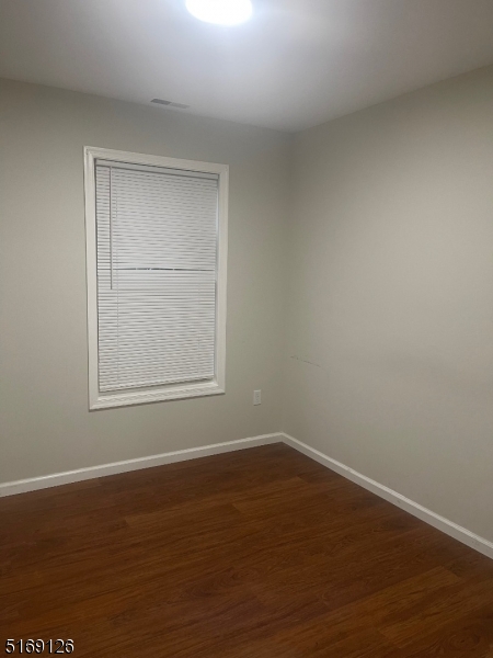 406 South 7th Street, Unit 2 Newark, NJ 07103 - Photo 9 of 9 a view of a room that has a window in it