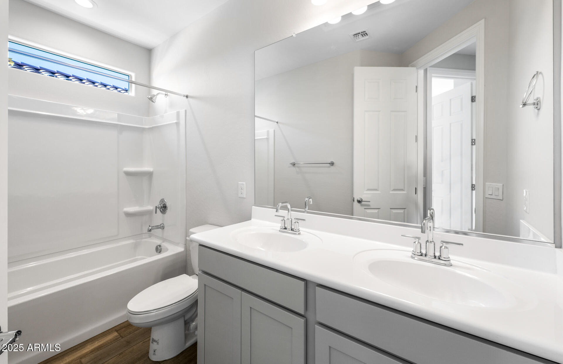 6808 West Ripken Way Florence, AZ 85132 - Photo 13 of 38 a bathroom with a sink a toilet and a bathtub