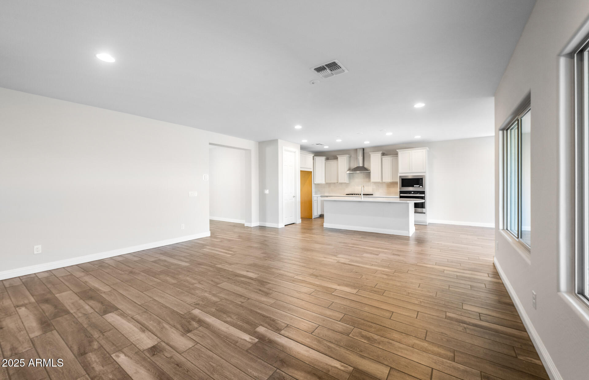 6808 West Ripken Way Florence, AZ 85132 - Photo 20 of 38 a view of kitchen with wooden floor