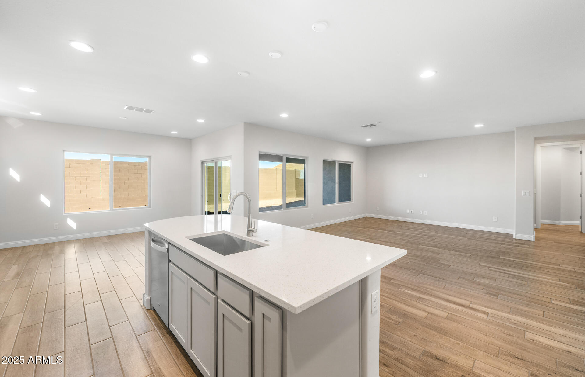 6808 West Ripken Way Florence, AZ 85132 - Photo 26 of 38 a kitchen with sink and center island