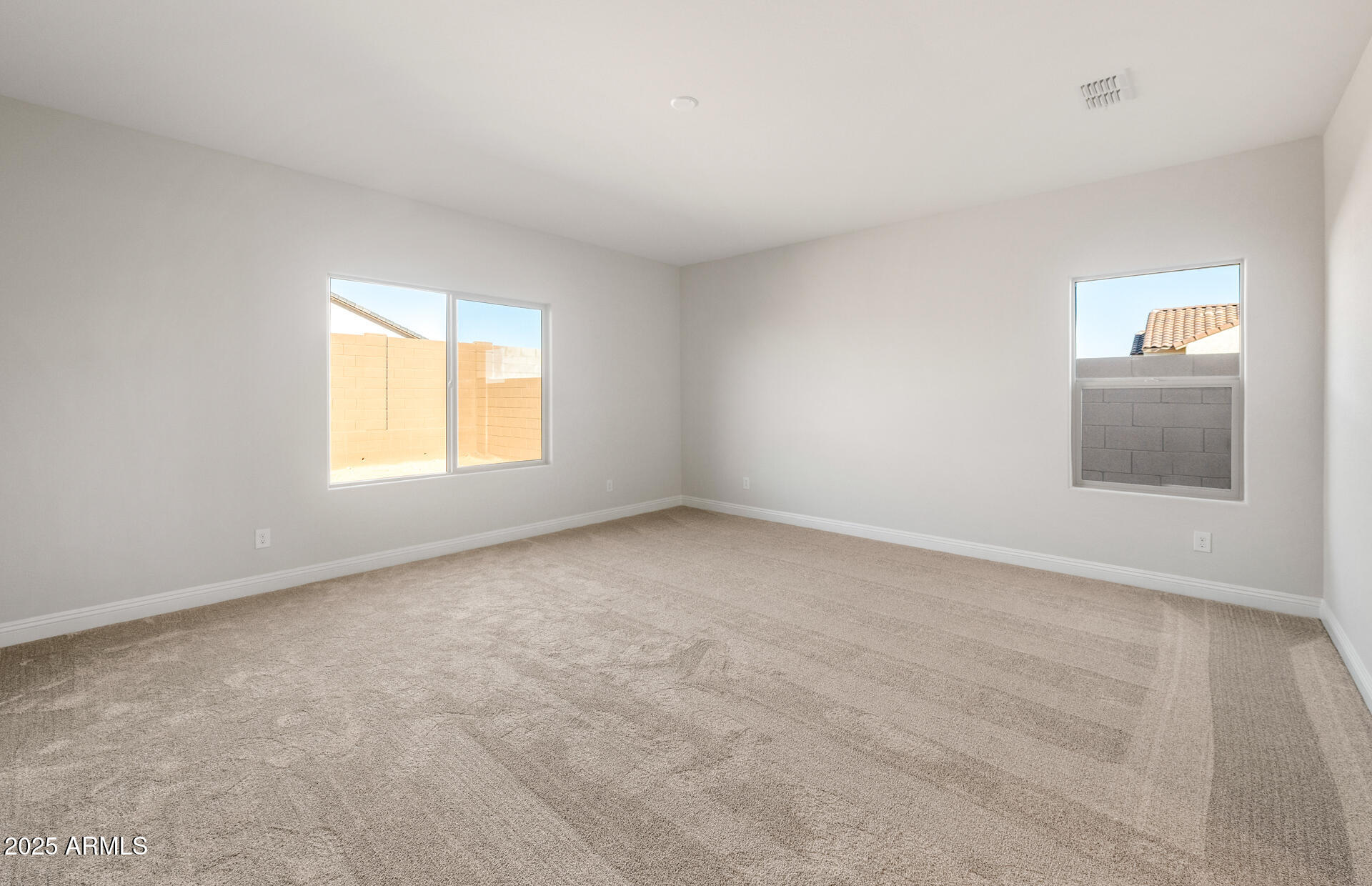 6808 West Ripken Way Florence, AZ 85132 - Photo 31 of 38 an empty room with windows