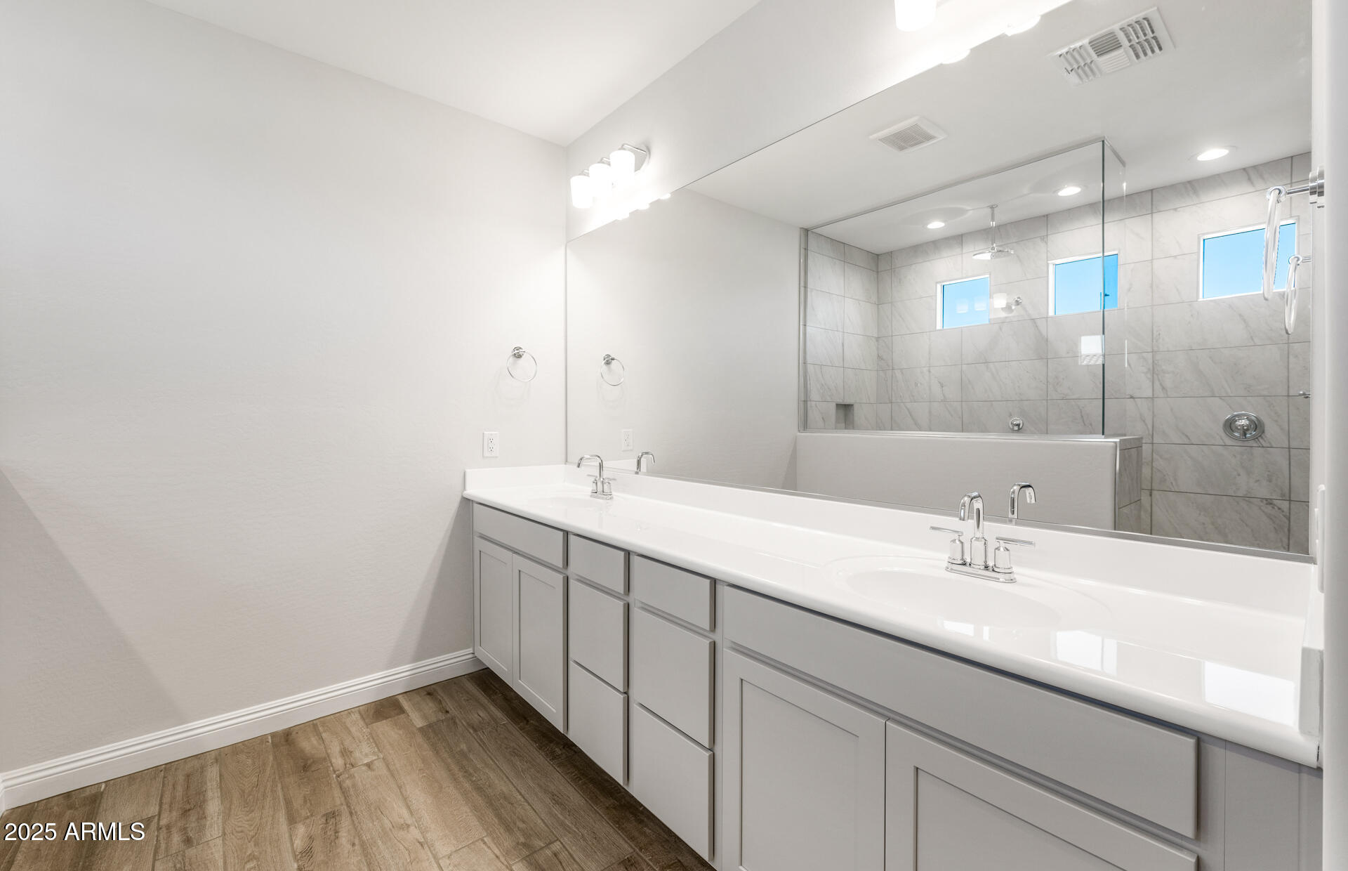 6808 West Ripken Way Florence, AZ 85132 - Photo 34 of 38 a bathroom with a sink and a mirror