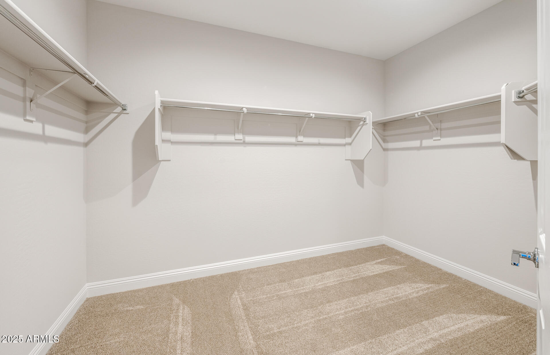 6808 West Ripken Way Florence, AZ 85132 - Photo 36 of 38 a view of an empty walk in closet