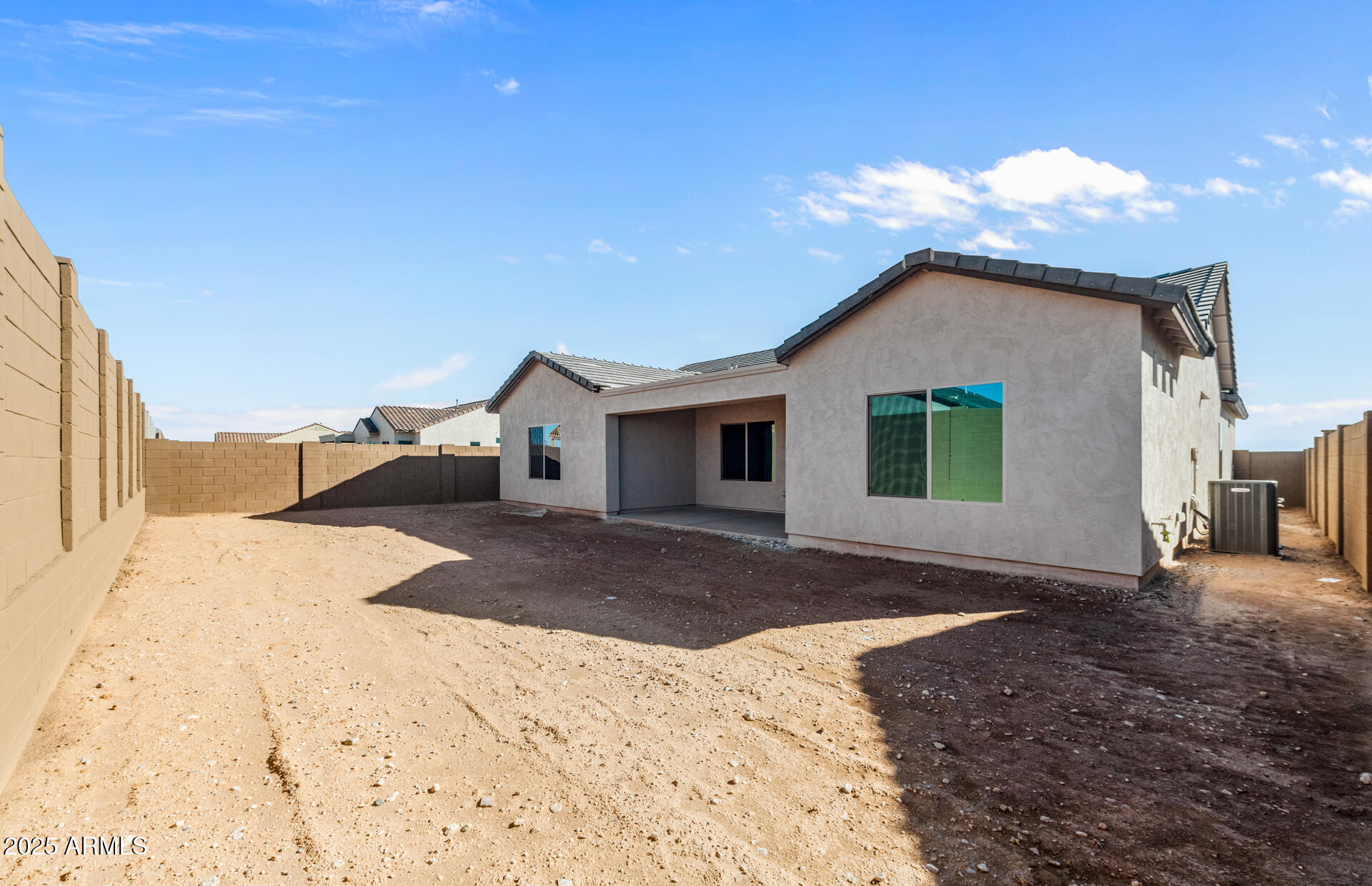 6808 West Ripken Way Florence, AZ 85132 - Photo 37 of 38 a front view of a house with a yard and garage