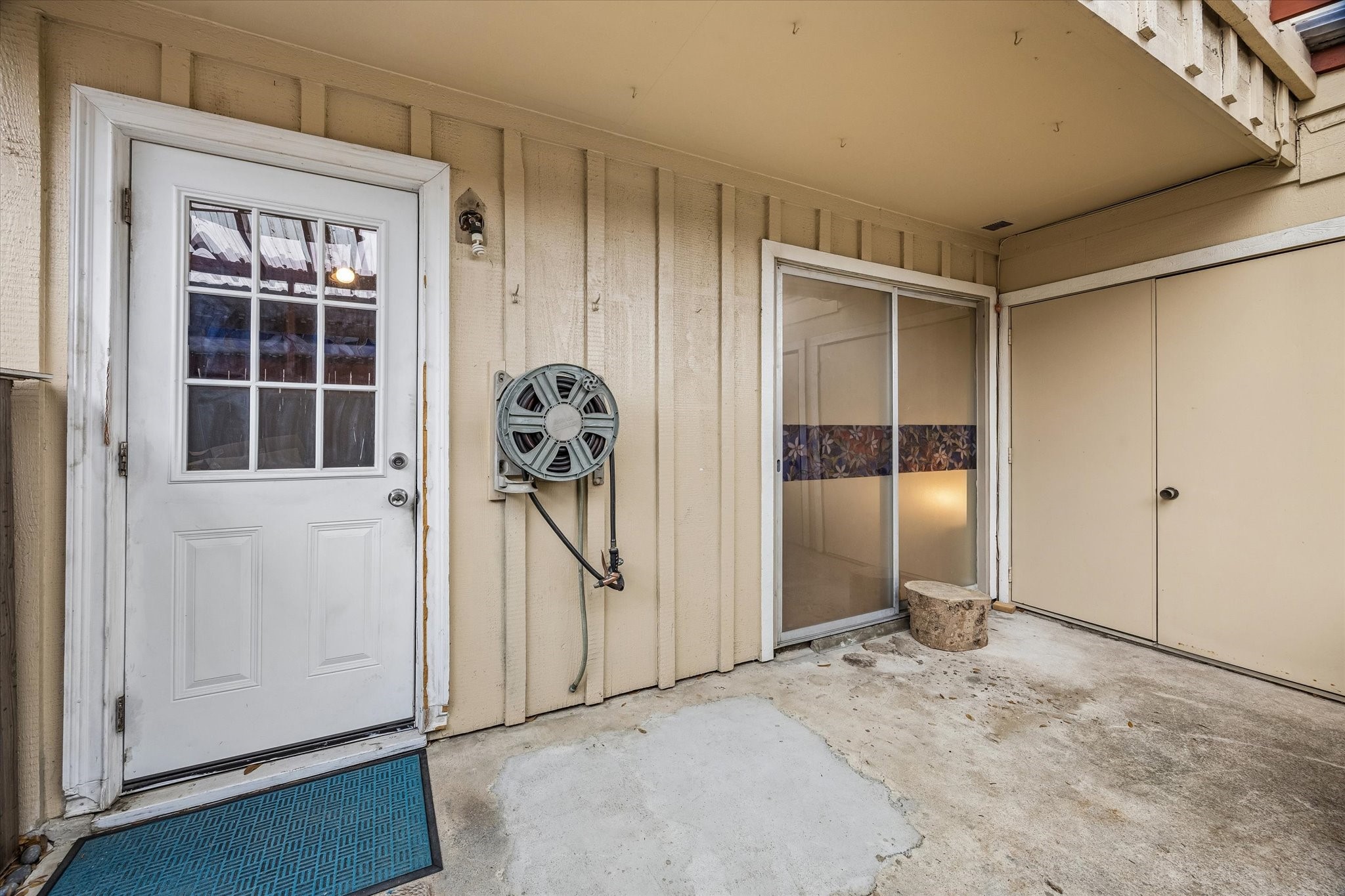 5218 Milwee Street, Unit 6 Houston, TX 77092 - Photo 11 of 14 Back patio with dryer/washer room on the right