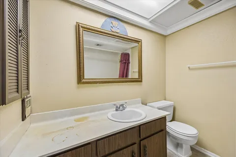 a bathroom with a sink and a toilet