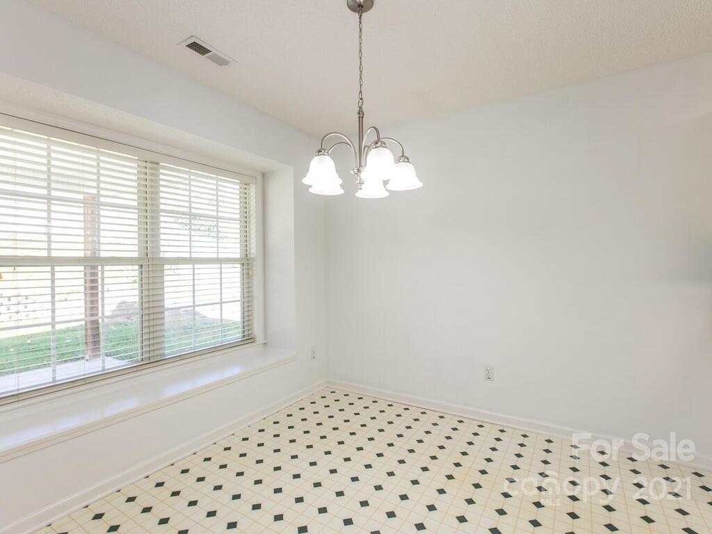 83 Planters Creek Road Fletcher, NC 28732 - Photo 13 of 38 a view of a big room with windows