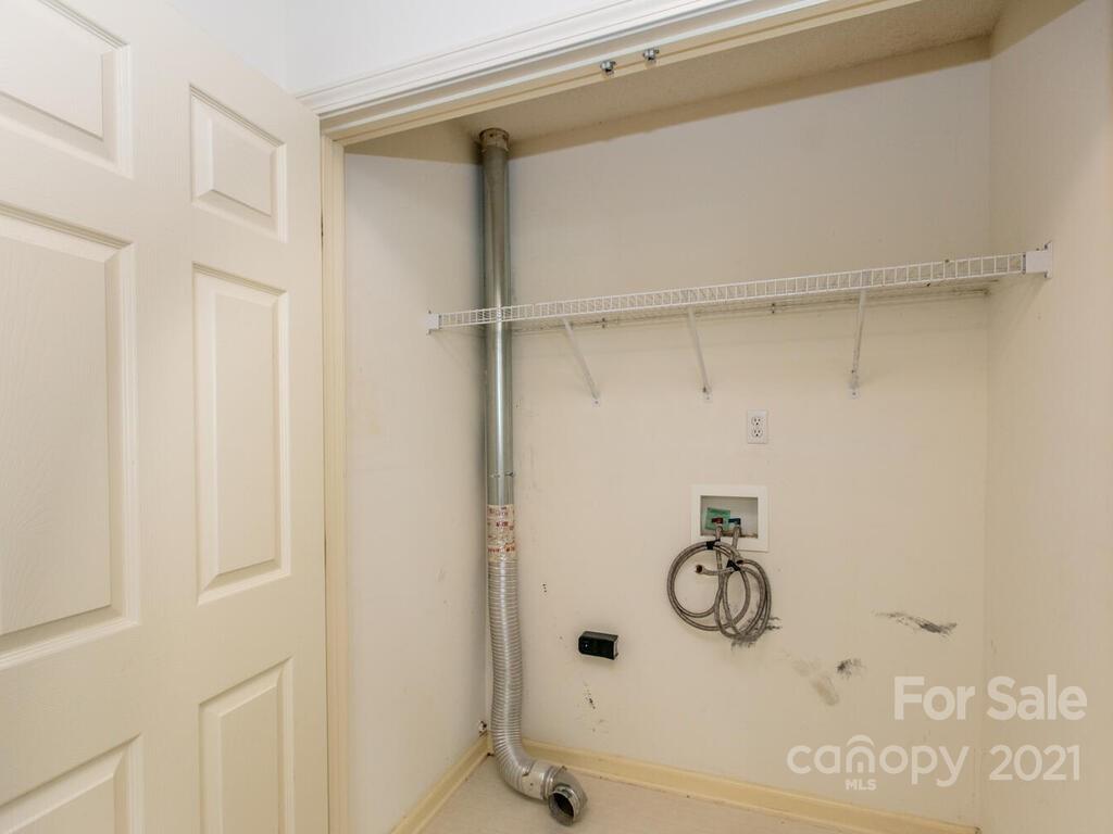 83 Planters Creek Road Fletcher, NC 28732 - Photo 31 of 38 a bathroom with a glass shower door